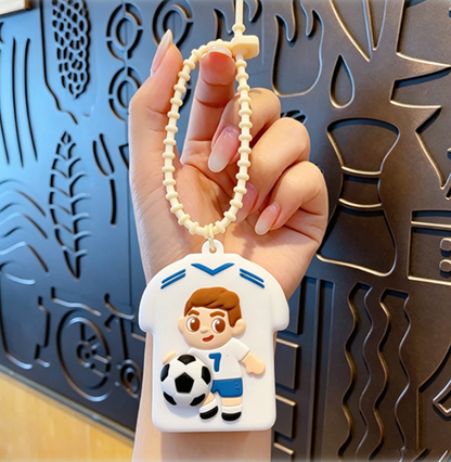 💥 BUY 2 GET 2 FREE + Free Shipping! 🥳Cute Football Player Squishy Keychain, Silicone Stress Relief Toy, Soccer Jersey Bag Charm for Kids & Adults